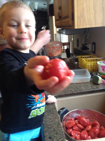 This is Hunter at 3 helping make pizza sauce